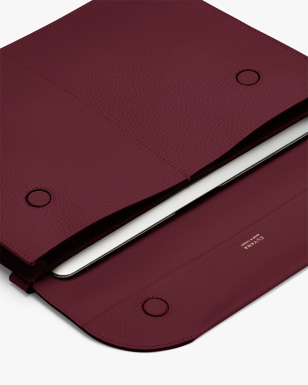 Open laptop case with two snaps and a visible laptop inside