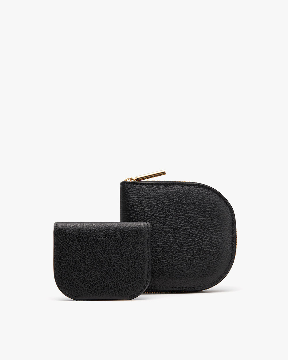Two small pouches, one larger than the other, both with zippers.