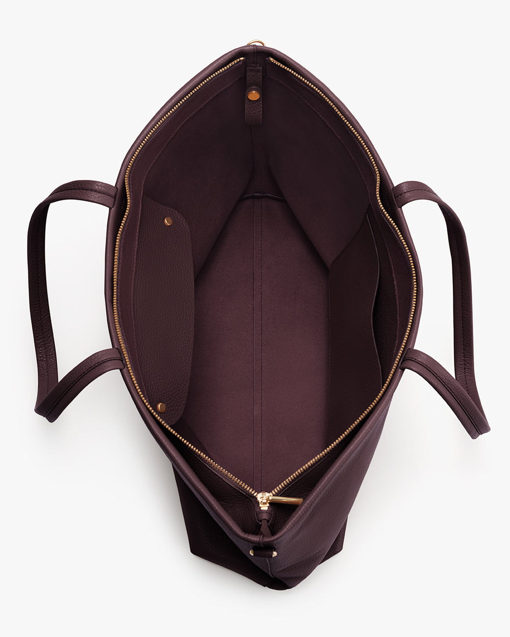 Open top view of a tote bag with a zipper and handles.