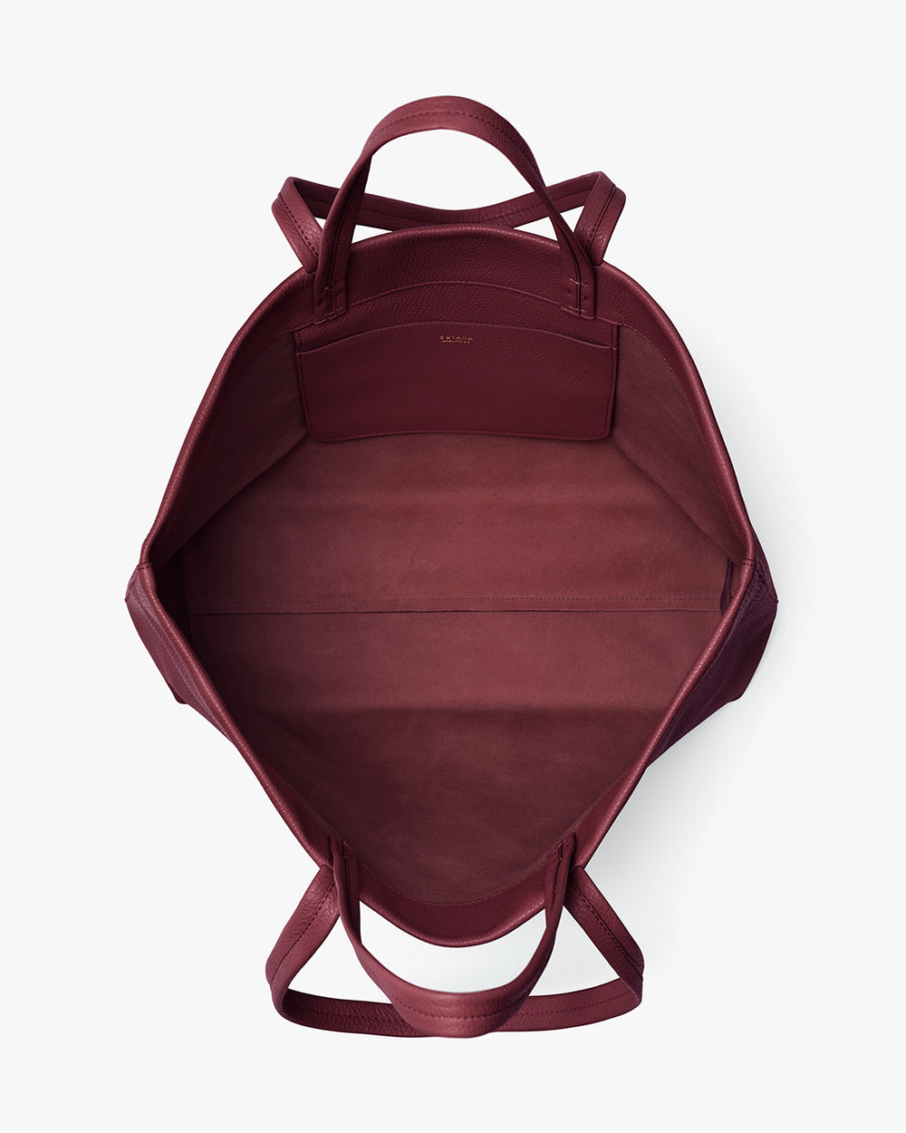 Open top view of an empty tote bag with two handles