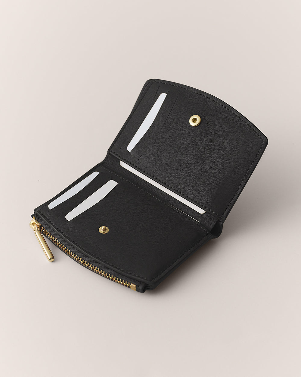 Open wallet with card slots, snap button, and zippered pocket