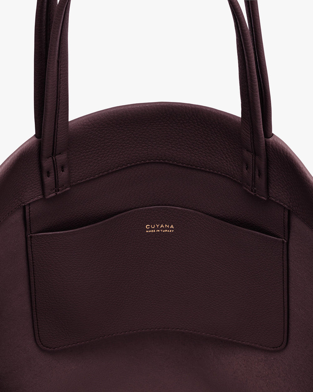 Leather tote bag with interior pocket and two handles