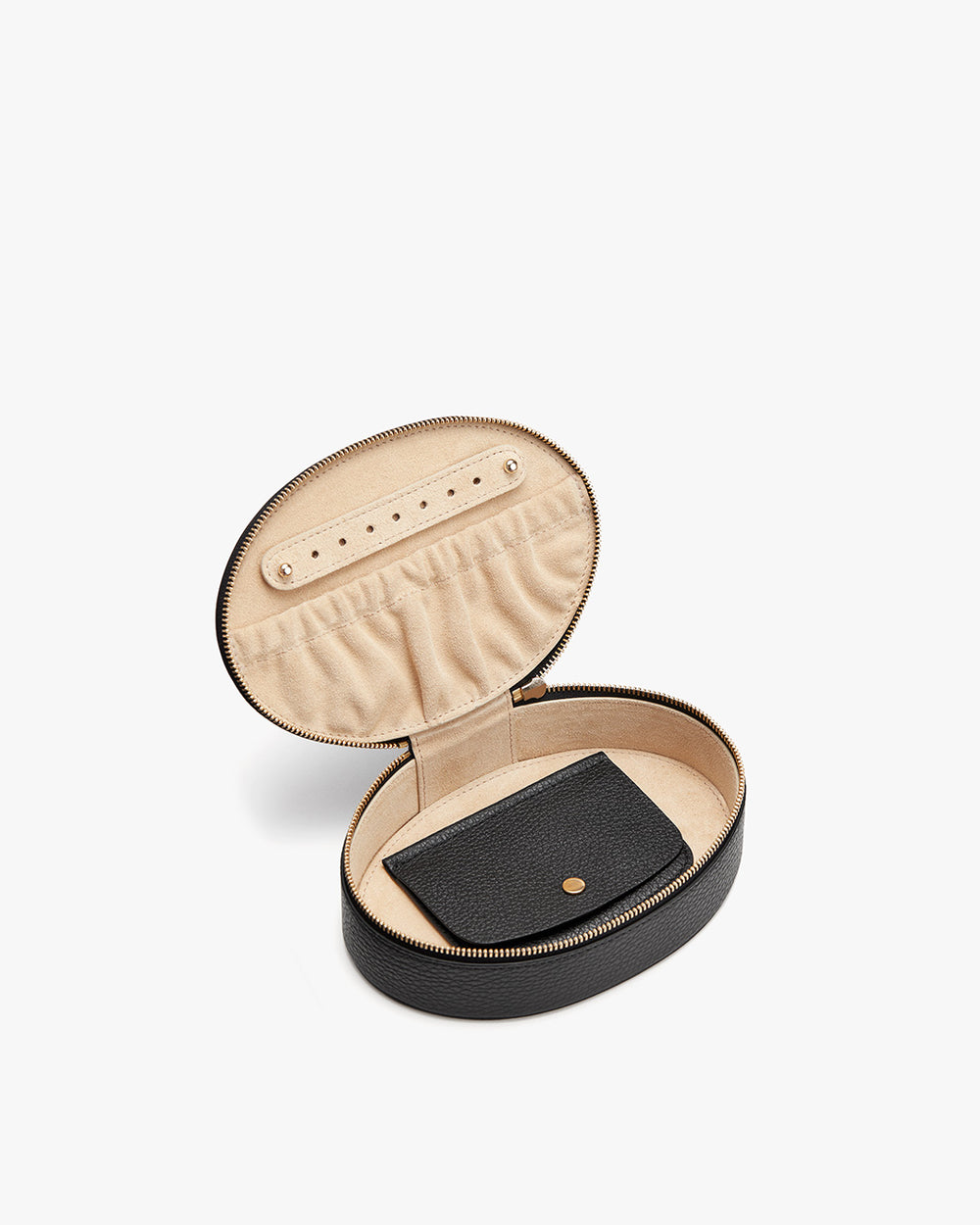 Small open jewelry box with an earring holder and a wallet inside.