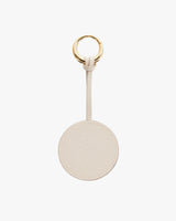 Keychain with a circular tag and a metal ring