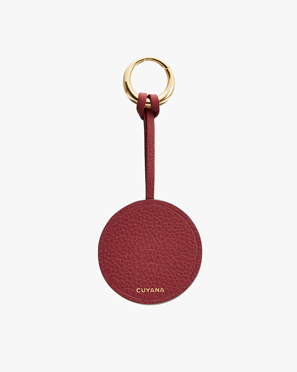 Keychain with a circular tag and metal ring, branded with a logo.