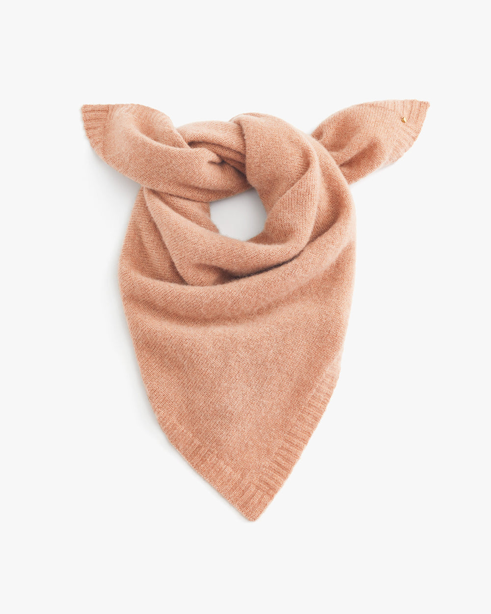 Knotted neck scarf on a plain background
