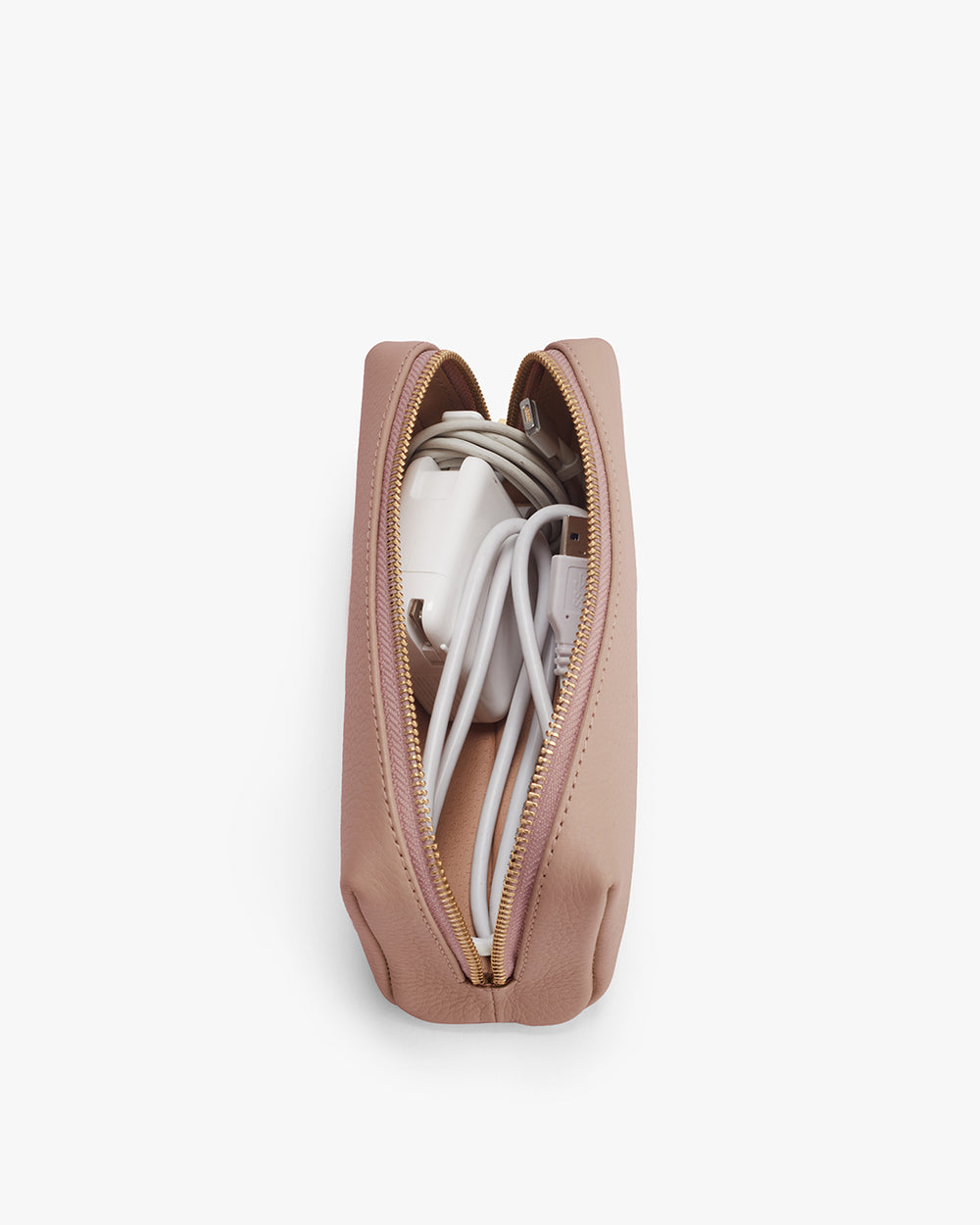 Top view of an open bag with shoes inside.