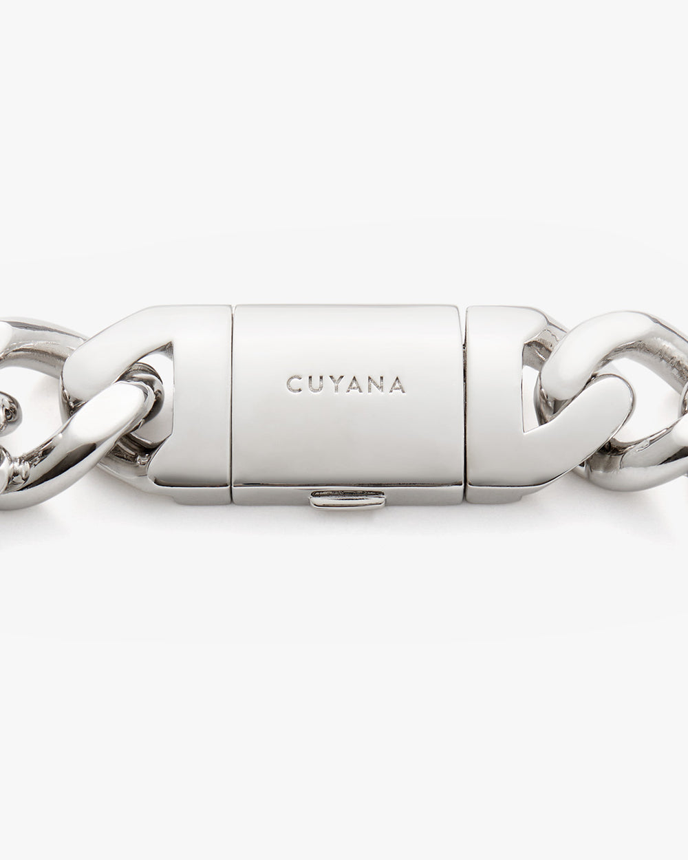 Close-up view of a metal clasp linking two chain sections.