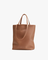 Tote bag standing against a plain background.