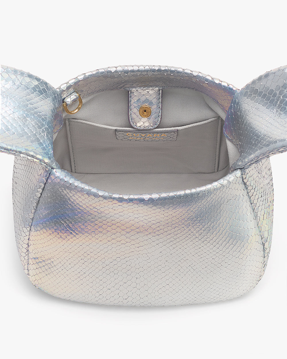 Open handbag with snake-embossed leather and empty interior compartment