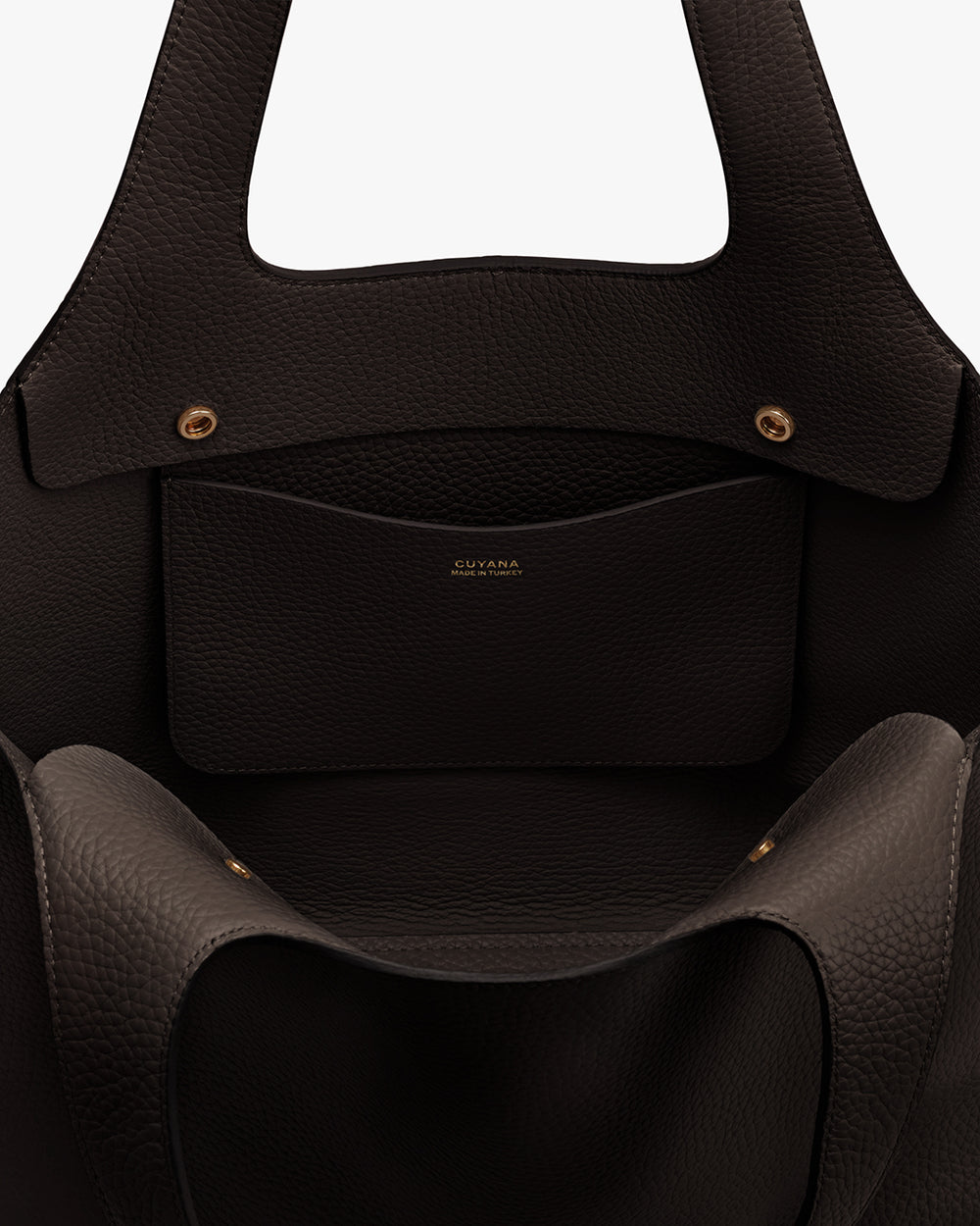 Open interior view of a bag with a pocket inside