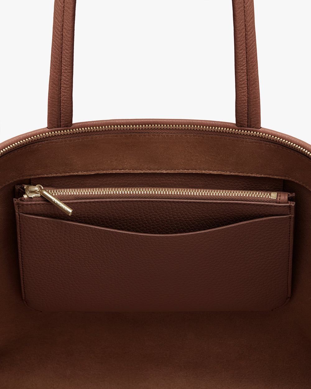 Open pouch with a visible inner zippered pocket.