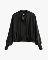 Bomber jacket with ribbed cuffs and snap buttons.