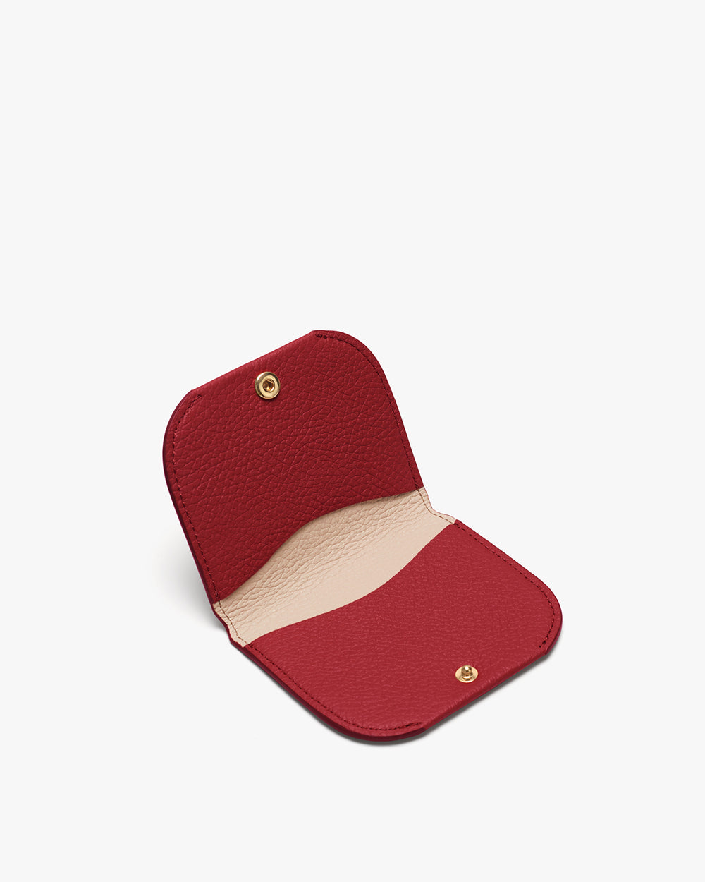 Open coin purse with a snap button closure.