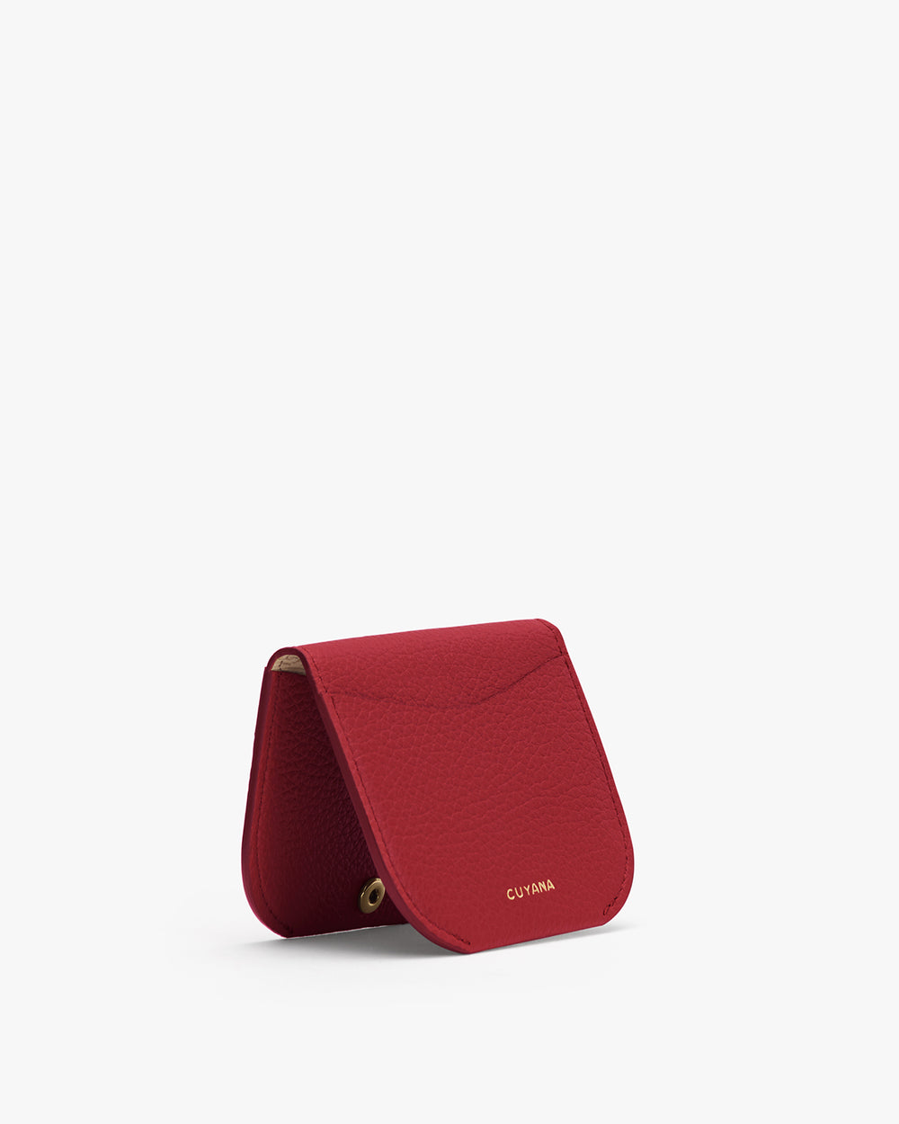 Small textured purse standing upright on a plain background.