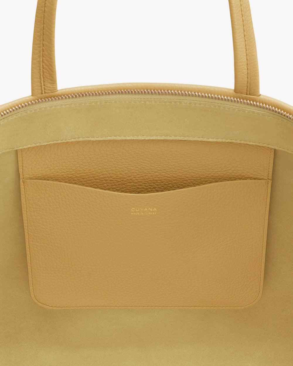 Close-up of a tote bag with interior pocket.