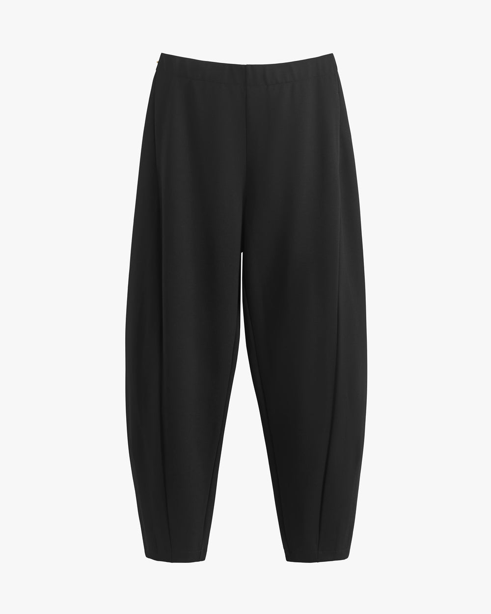 Loose-fitting trousers on a plain background.