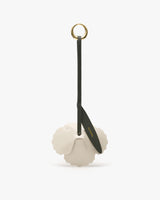 Flower-shaped keychain with a circular ring and strap.