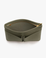 Open clutch bag with zipper and wide opening.
