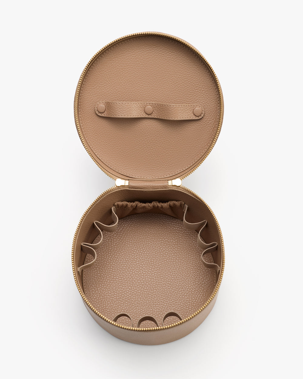 Round open container with zipper, elastic pockets, and buttoned strap inside.