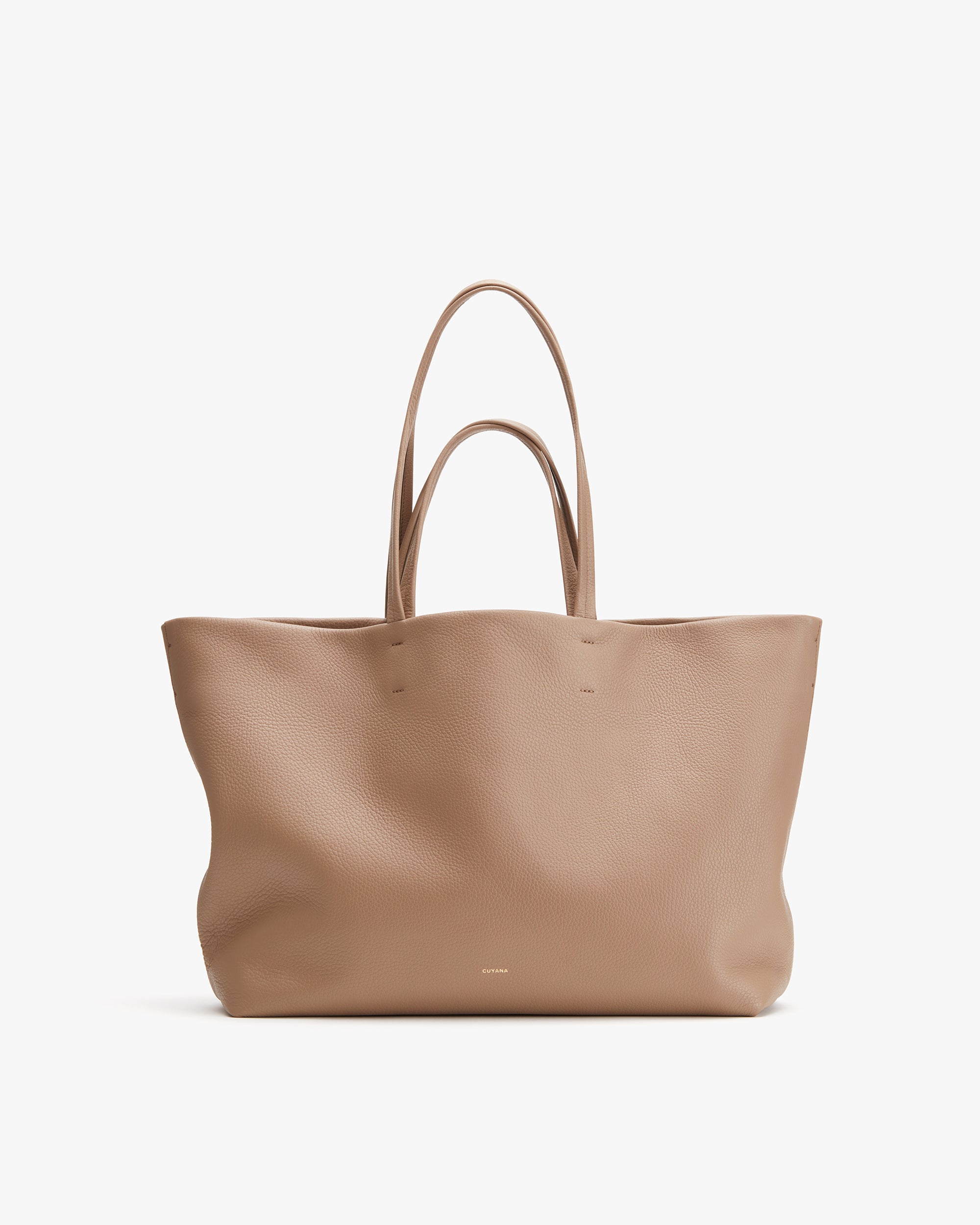 Tote bag with long handles displayed on a plain background.