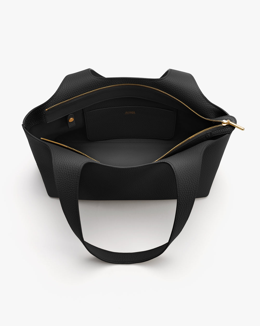 Open tote bag with interior pocket and zipper seen from above.