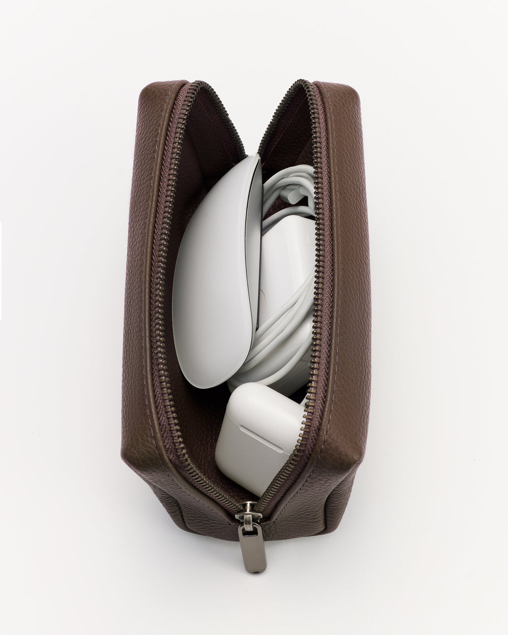 Open zip pouch holding mouse, charger, and cable.