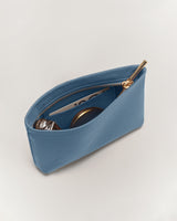 Small zippered pouch with a watch, pen, and sunglasses inside.