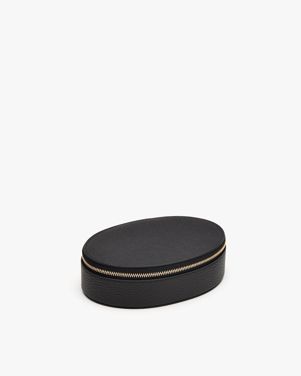 Oval case with a zipper on a plain background.