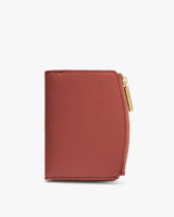 Small zippered wallet with stitching detail on the side.