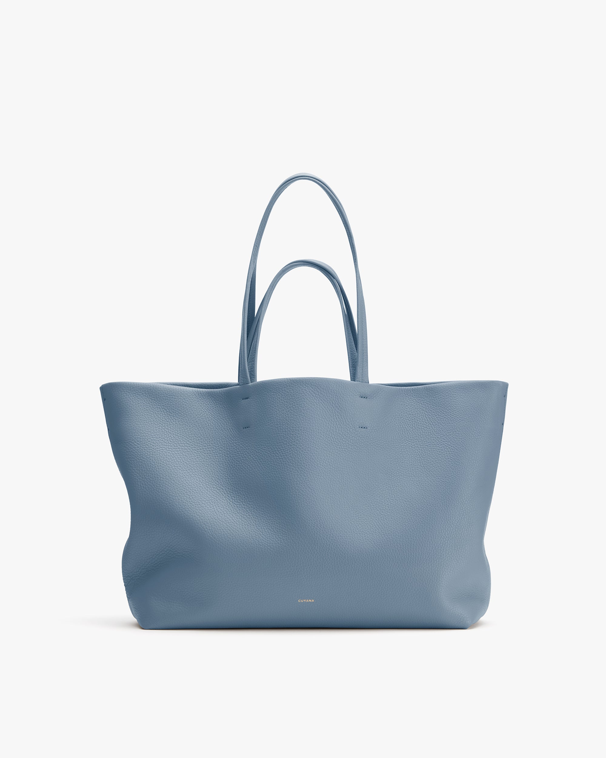Large tote bag with two handles displayed on a plain background.