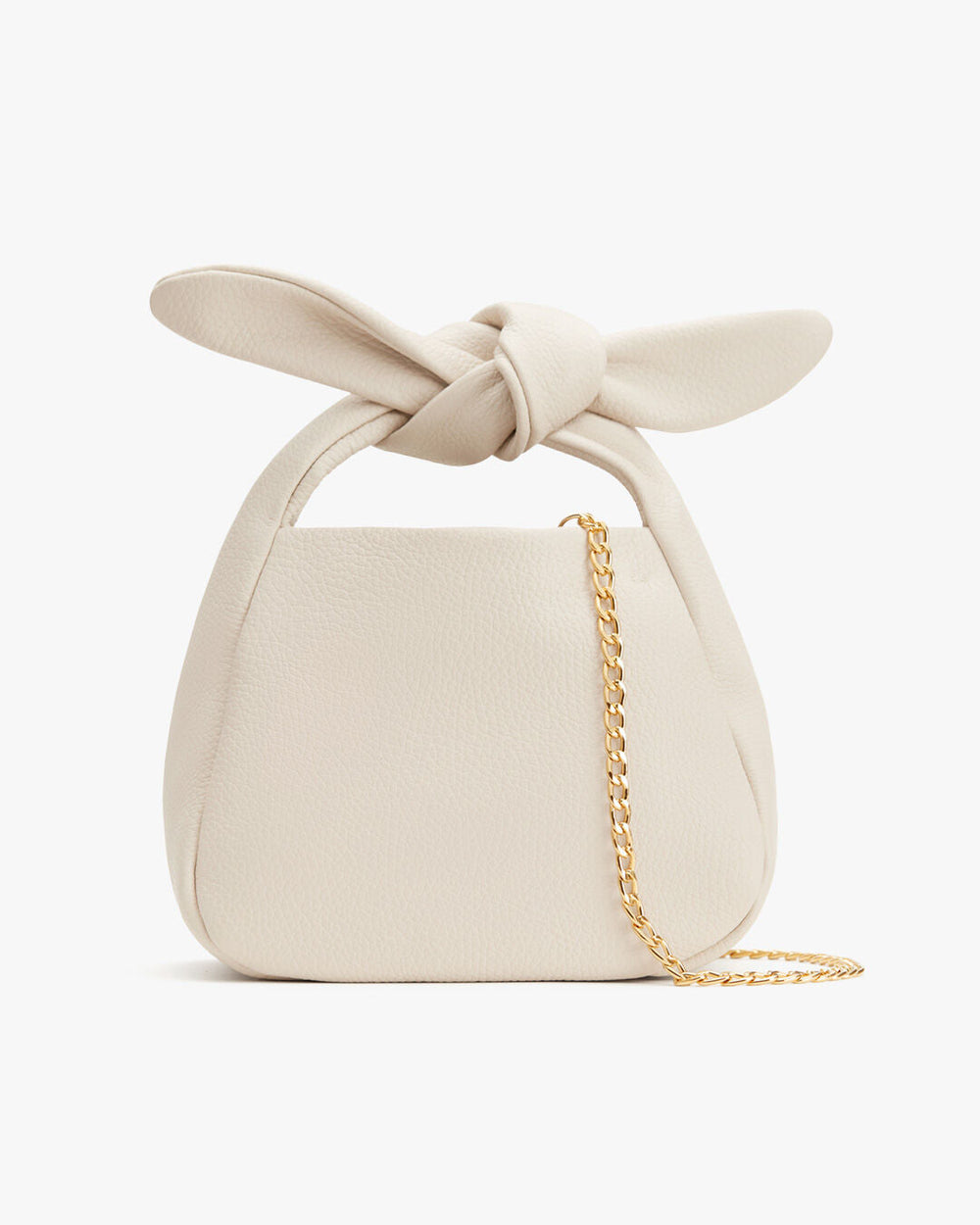 Handbag with a knotted handle and a chain strap.