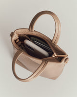 Handbag with a cellphone and wallet inside