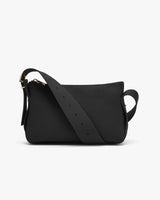 Small shoulder bag with adjustable strap and zipper closure.