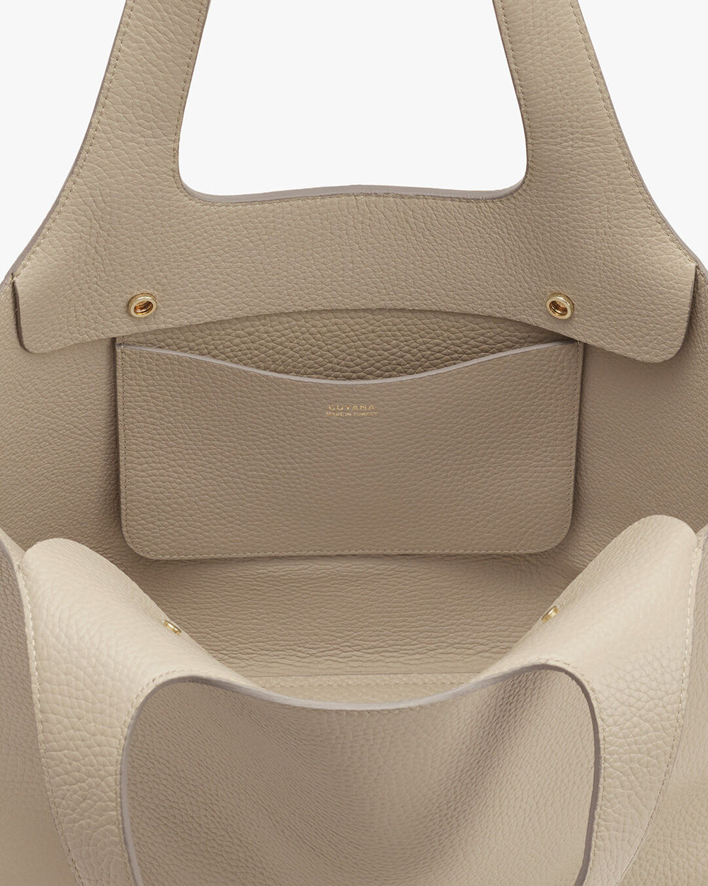 Open handbag with visible inner pocket