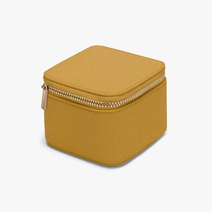 Small square zippered case on a plain background.