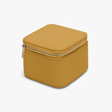 Small square zippered case on a plain background.