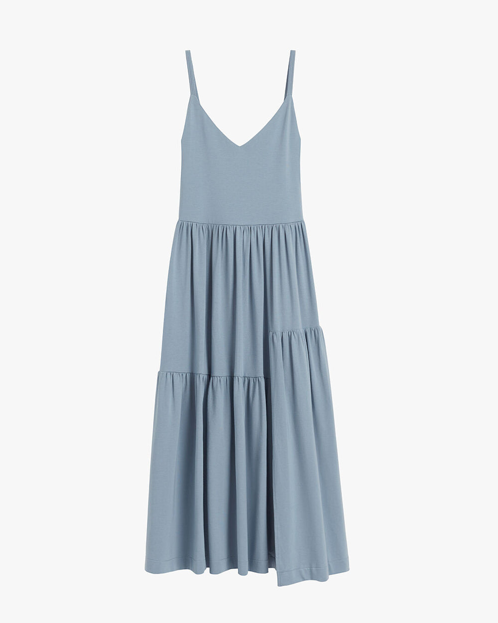 Sleeveless dress with tiered skirt.