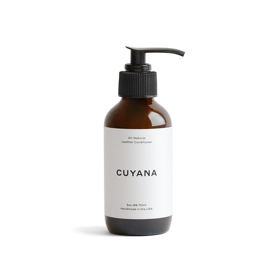 Bottle with pump dispenser labeled as leather conditioner.