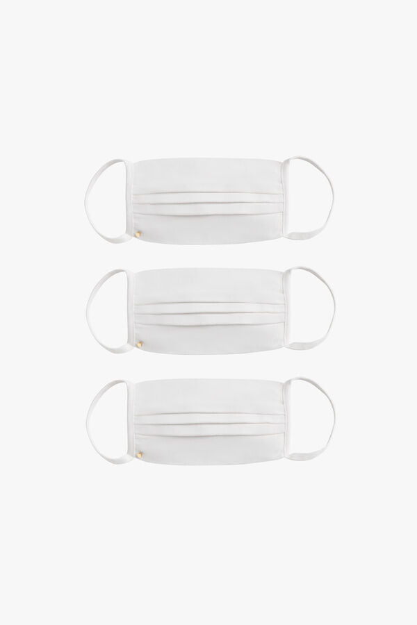 Three face masks arranged vertically on a plain background.